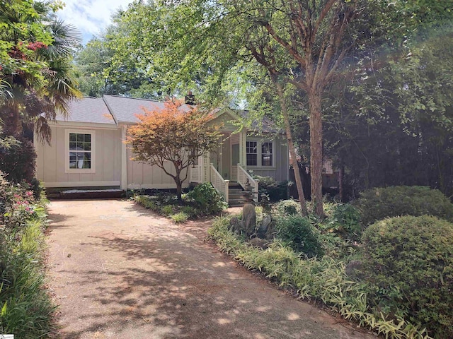 14 Dixie Ave, Greenville, SC 29607 - view of front facade with board and batten siding and concrete driveway