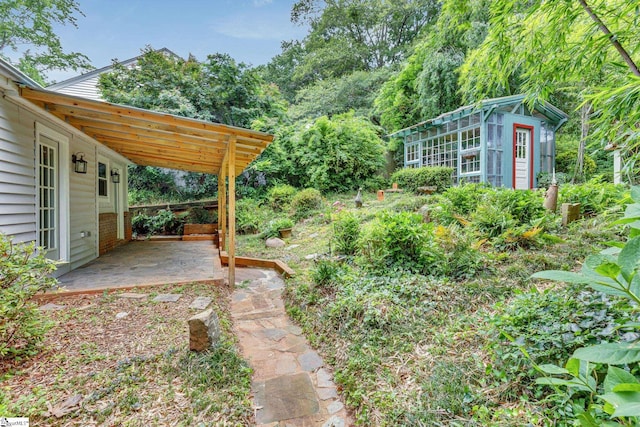 14 Dixie Ave, Greenville, SC 29607 - view of yard featuring a patio area and an outdoor structure