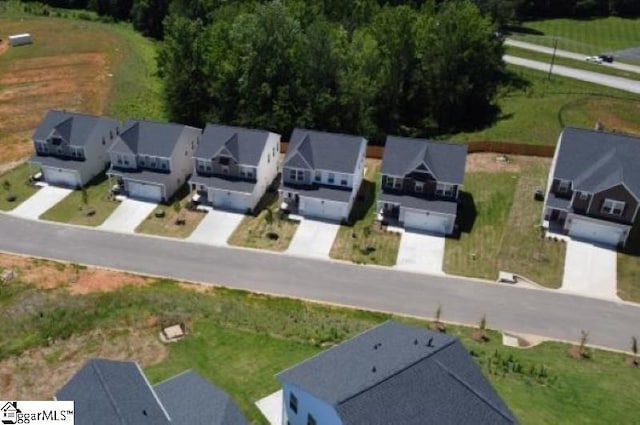 aerial overview of property's location with nearby suburban area