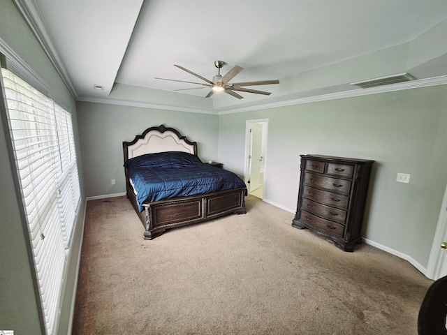 bedroom with multiple windows, carpet flooring, baseboards, and crown molding