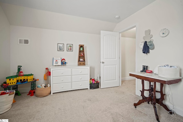 playroom featuring light colored carpet and baseboards