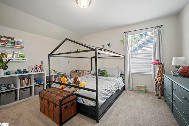 carpeted bedroom with baseboards