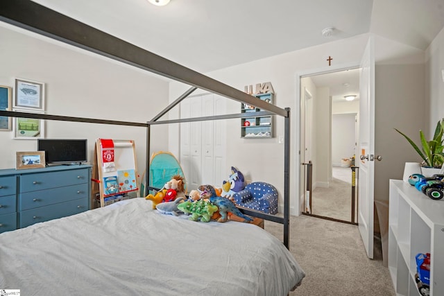 carpeted bedroom featuring baseboards