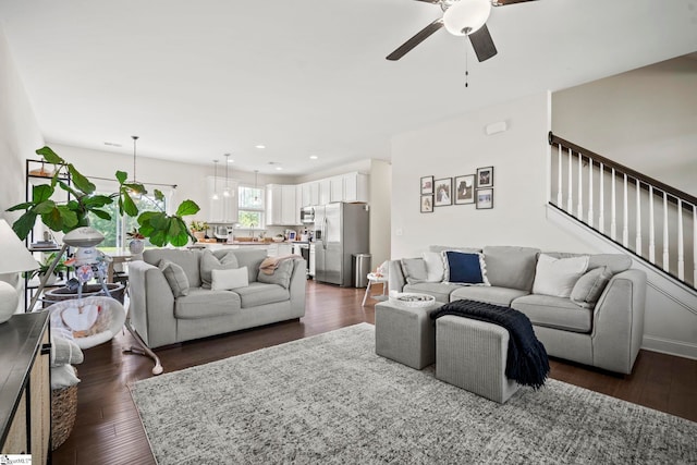 living area with ceiling fan, dark wood-style floors, stairs, and recessed lighting