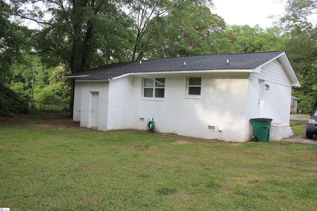 305 N Owens St, Clinton, SC 29325 - back of house featuring crawl space, brick siding, a yard, and roof with shingles