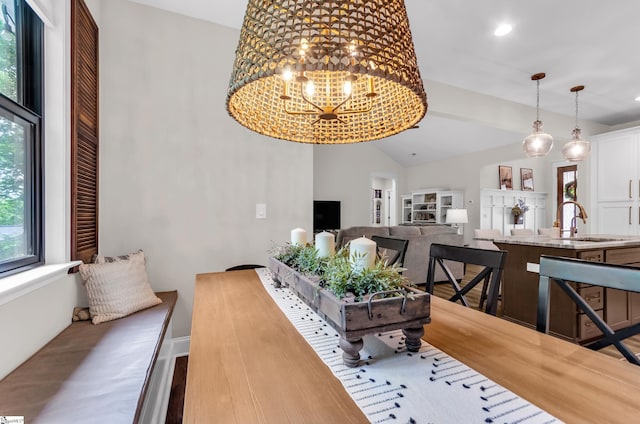 203 N Hogan Dr, Westminster, SC 29693 - dining space featuring lofted ceiling, wood finished floors, a chandelier, baseboards, and recessed lighting