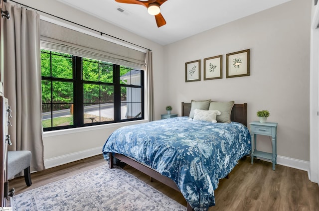 203 N Hogan Dr, Westminster, SC 29693 - bedroom featuring baseboards, wood finished floors, and a ceiling fan
