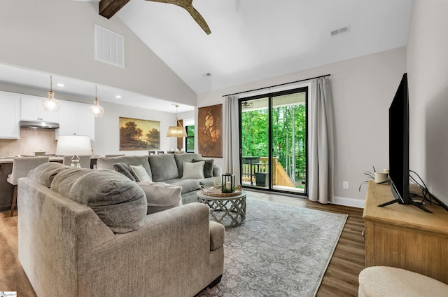 203 N Hogan Dr, Westminster, SC 29693 - living area featuring a ceiling fan, wood finished floors, high vaulted ceiling, beam ceiling, and baseboards