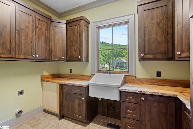 160 Mountain Brook Trl, Greenville, SC 29609 - washroom featuring hookup for an electric dryer, crown molding, baseboards, and cabinet space