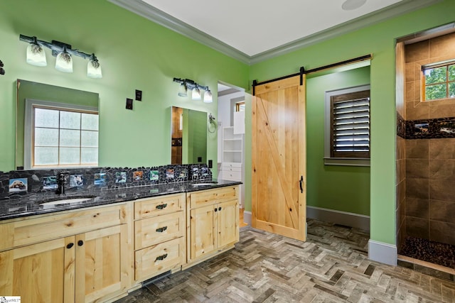 160 Mountain Brook Trl, Greenville, SC 29609 - full bathroom with tiled shower, baseboards, crown molding, and double vanity