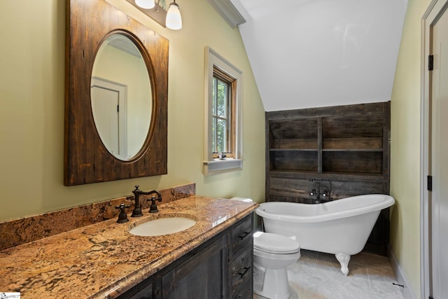 160 Mountain Brook Trl, Greenville, SC 29609 - bathroom with a freestanding bath, vanity, toilet, tile patterned floors, and lofted ceiling