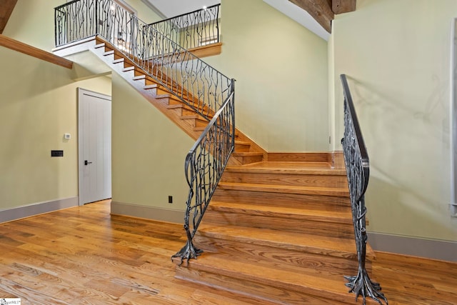 160 Mountain Brook Trl, Greenville, SC 29609 - stairs with wood finished floors, baseboards, and a towering ceiling