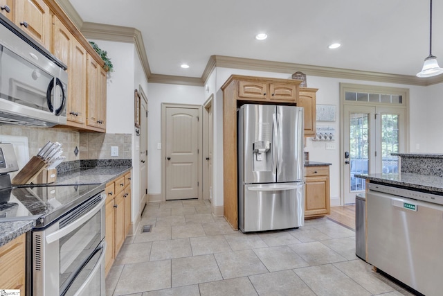 kitchen featuring appliances with stainless steel finishes, ornamental molding, light brown cabinets, decorative backsplash, and dark stone countertops