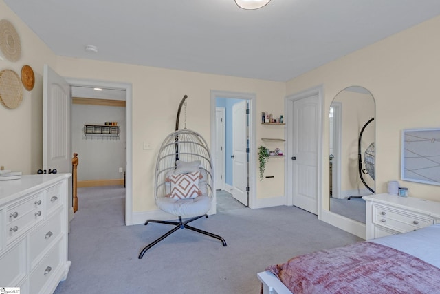 bedroom with carpet flooring and baseboards