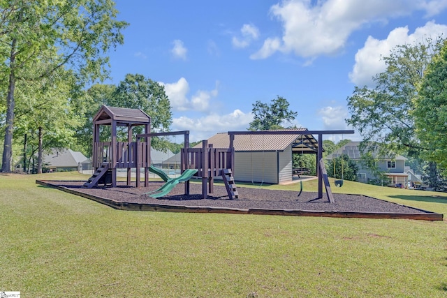 communal playground featuring a lawn