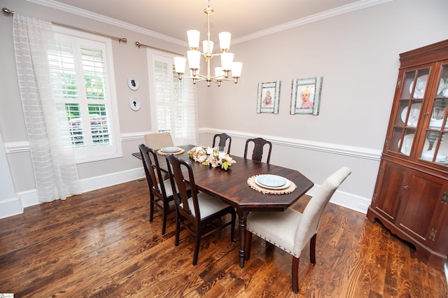 dining area with a chandelier, dark wood-type flooring, and crown molding