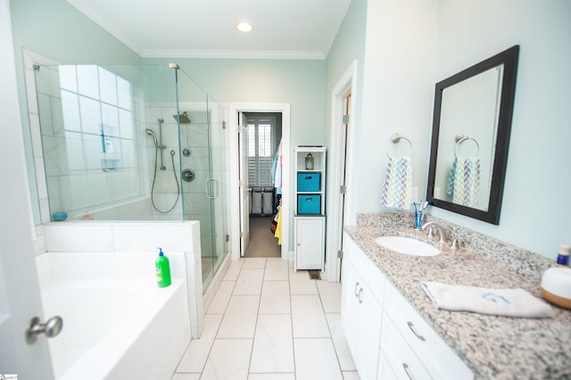 bathroom featuring crown molding, a stall shower, a bath, double vanity, and recessed lighting