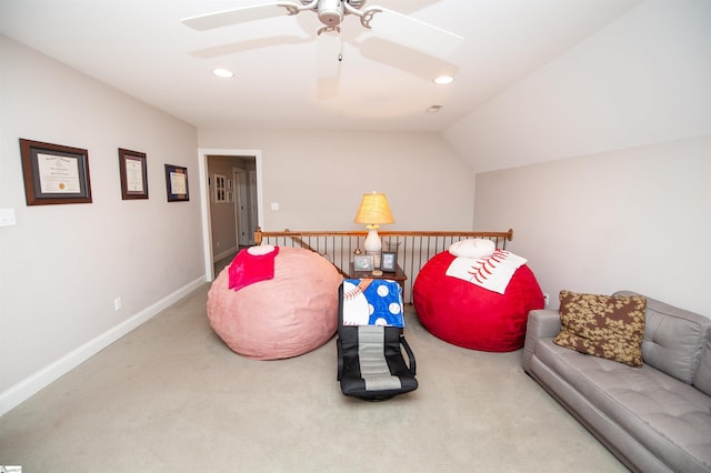 sitting room featuring ceiling fan, carpet floors, recessed lighting, vaulted ceiling, and baseboards