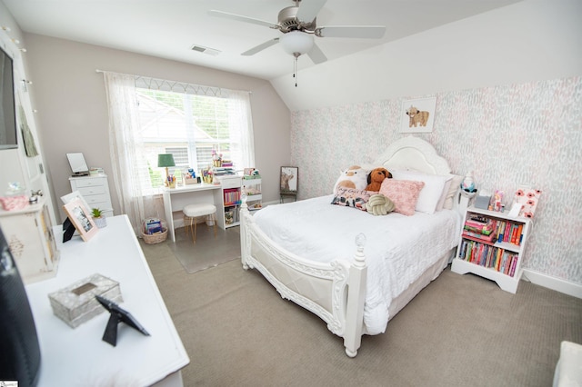 bedroom featuring wallpapered walls, lofted ceiling, ceiling fan, light colored carpet, and baseboards