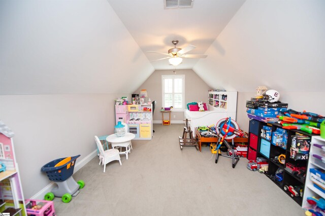 game room with vaulted ceiling, a ceiling fan, carpet flooring, and baseboards