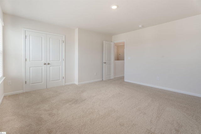 737 Rockhurst Way, Woodruff, SC 29388 - unfurnished bedroom featuring light carpet, baseboards, and a closet