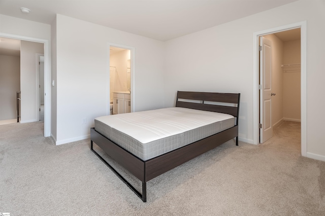 737 Rockhurst Way, Woodruff, SC 29388 - bedroom featuring carpet flooring, baseboards, and a walk in closet