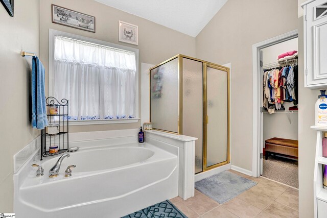 5 Laurelcrest Ln, Travelers Rest, SC 29690 - full bath featuring a garden tub, a shower stall, tile patterned flooring, and a walk in closet