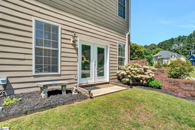 5 Laurelcrest Ln, Travelers Rest, SC 29690 - view of side of home with french doors and a yard