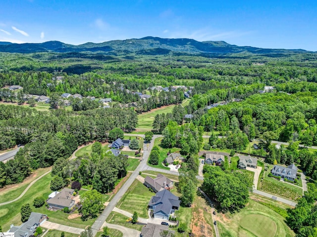5 Laurelcrest Ln, Travelers Rest, SC 29690 - aerial view of residential area featuring a mountain backdrop, a heavily wooded area, and a golf course