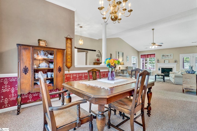 5 Laurelcrest Ln, Travelers Rest, SC 29690 - carpeted dining room featuring a ceiling fan, lofted ceiling, a glass covered fireplace, and a chandelier