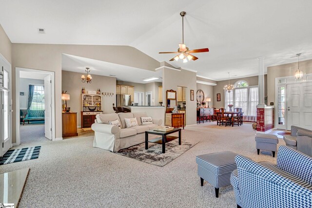 5 Laurelcrest Ln, Travelers Rest, SC 29690 - living area featuring light carpet, a chandelier, lofted ceiling, a ceiling fan, and baseboards