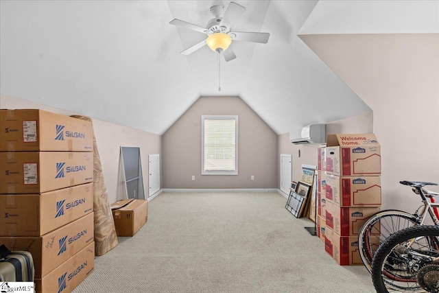 bonus room featuring an AC wall unit, carpet flooring, lofted ceiling, ceiling fan, and baseboards