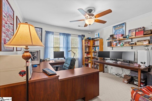 office area with ceiling fan, crown molding, and carpet