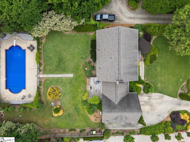 aerial view of property's location featuring a pool