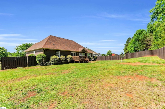 view of yard featuring a deck