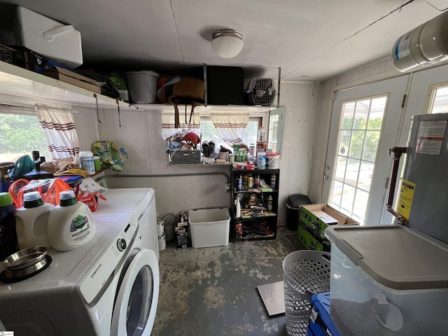 washroom featuring washer and clothes dryer