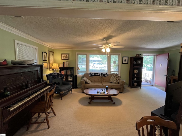 carpeted living room with ornamental molding, a ceiling fan, and a textured ceiling