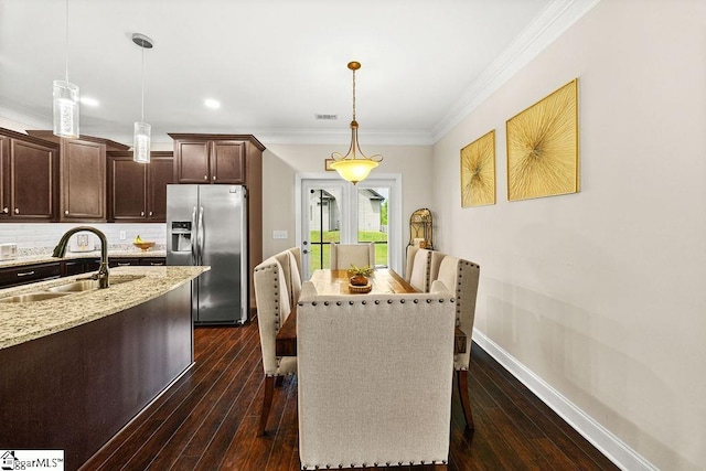 208 Laurel Trace Cir, Piedmont, SC 29673 - dining area featuring ornamental molding, dark wood-style flooring, and baseboards