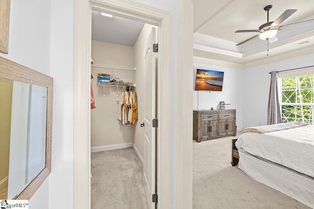 208 Laurel Trace Cir, Piedmont, SC 29673 - carpeted bedroom with crown molding, baseboards, a tray ceiling, a ceiling fan, and a closet