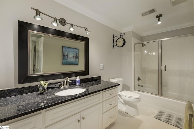 full bath featuring crown molding, toilet, vanity, combined bath / shower with glass door, and tile patterned floors