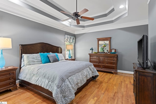 1008 Calumet Ct, Piedmont, SC 29673 - bedroom featuring a raised ceiling, ornamental molding, light wood-type flooring, ceiling fan, and recessed lighting