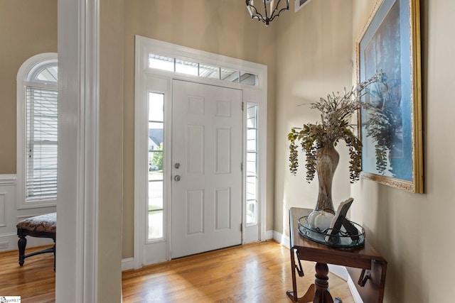 1008 Calumet Ct, Piedmont, SC 29673 - foyer with wood finished floors and a chandelier
