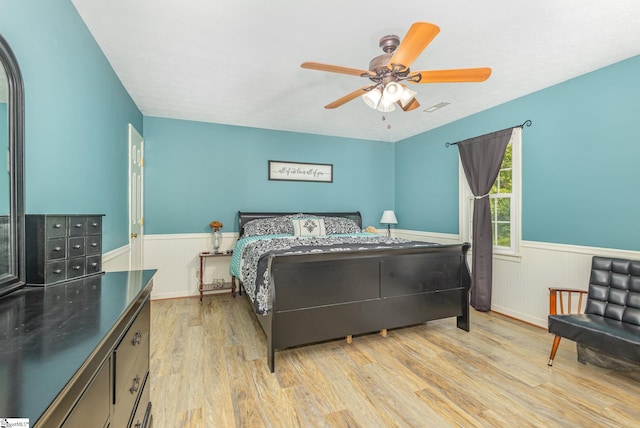 108 Ascot Ct, Easley, SC 29642 - bedroom with wainscoting, light wood-type flooring, and ceiling fan