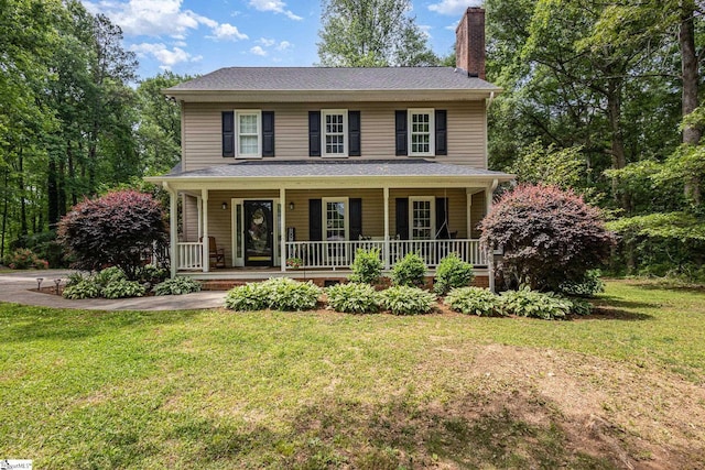108 Ascot Ct, Easley, SC 29642 - view of front facade with a chimney, a front lawn, and a porch