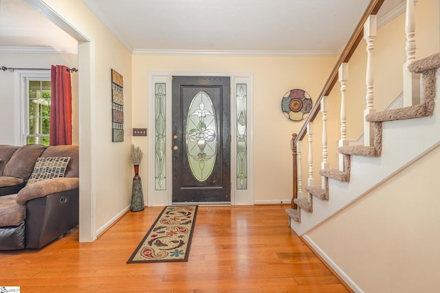 108 Ascot Ct, Easley, SC 29642 - entrance foyer with wood finished floors, stairway, crown molding, and baseboards