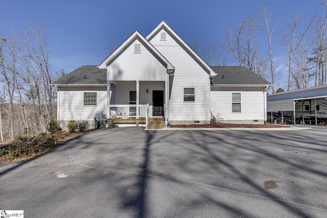 view of front of house featuring a porch, roof with shingles, and crawl space