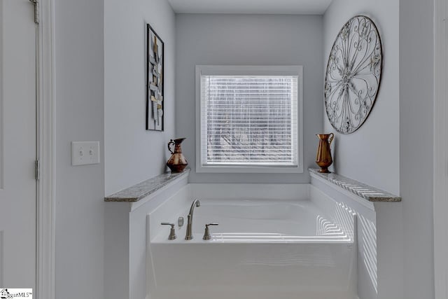full bath with a bath