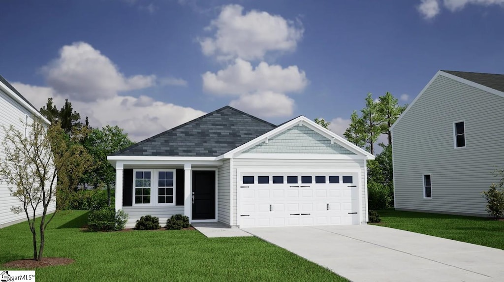 view of front of property with a garage, concrete driveway, and a front lawn