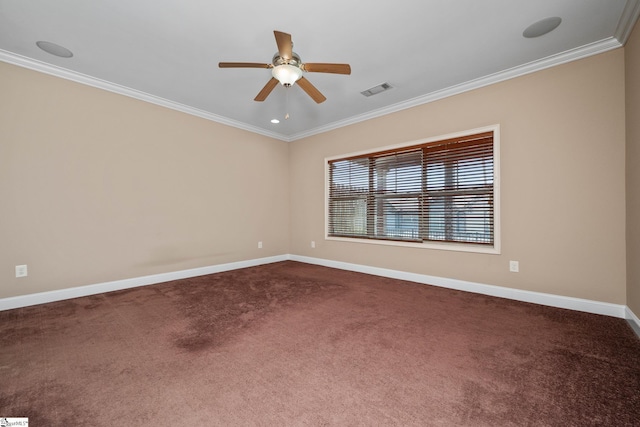 unfurnished room with crown molding, baseboards, dark colored carpet, and a ceiling fan