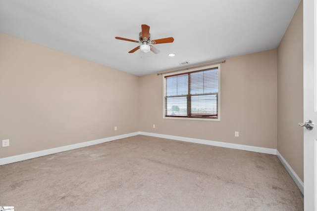 spare room featuring ceiling fan, carpet, baseboards, and recessed lighting